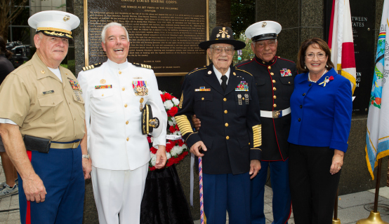 Mayor Jacobs with personnel honoring Memorial Day