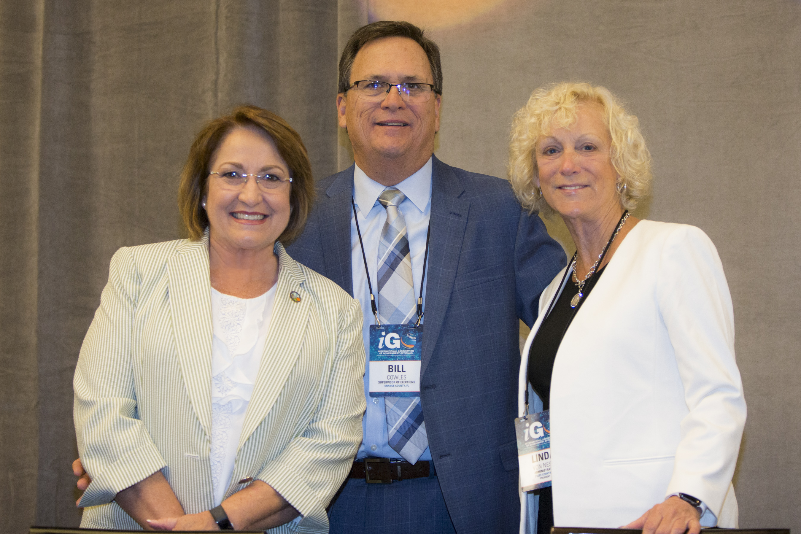 Mayor Jacobs with two individuals at the International Association of Government Officials Conference