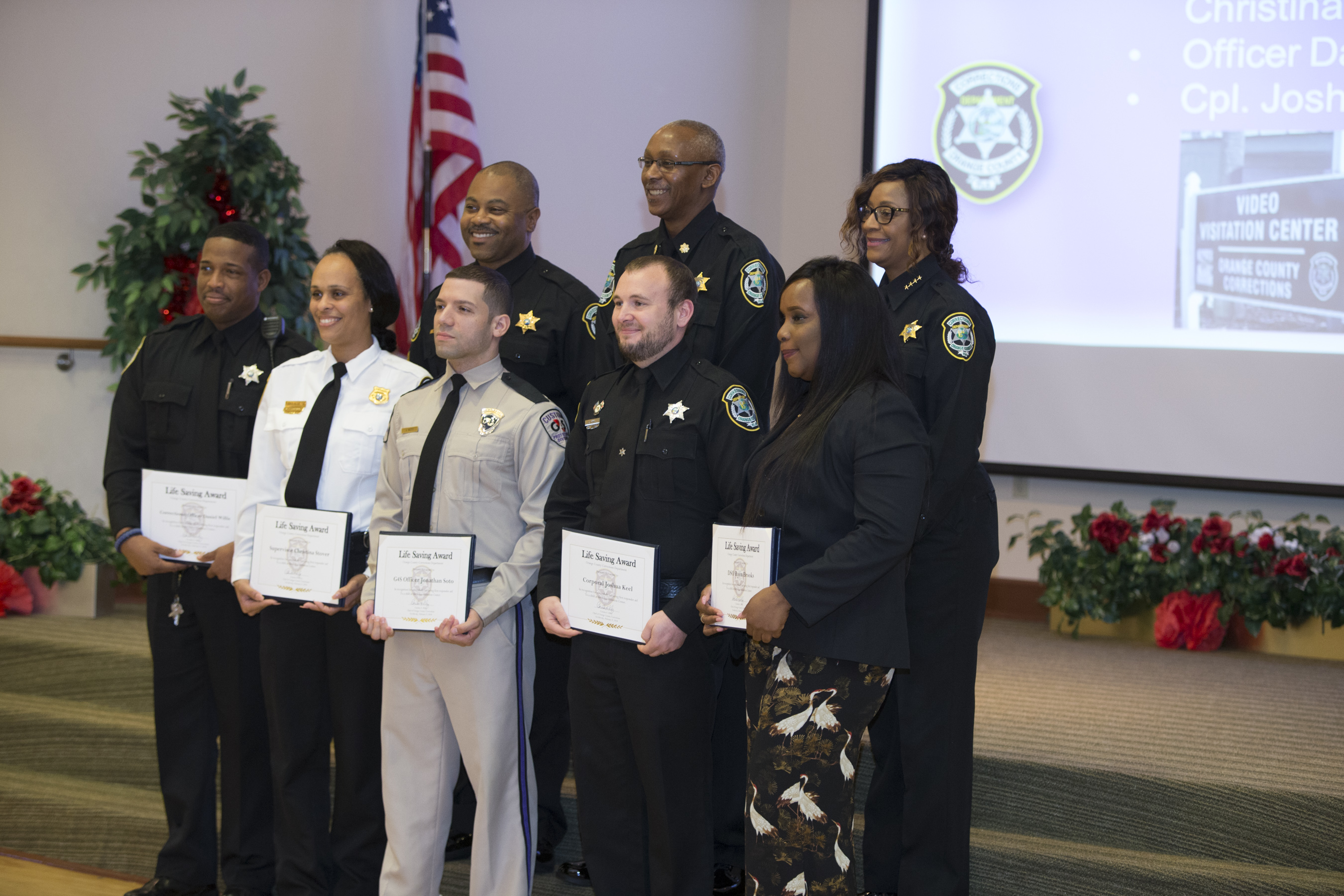 OCFL Corrections officers holding awards