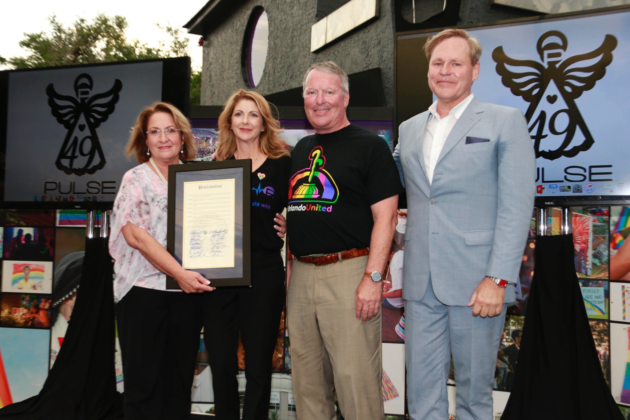 Four people, including Mayor Jacobs and Mayor Dyer