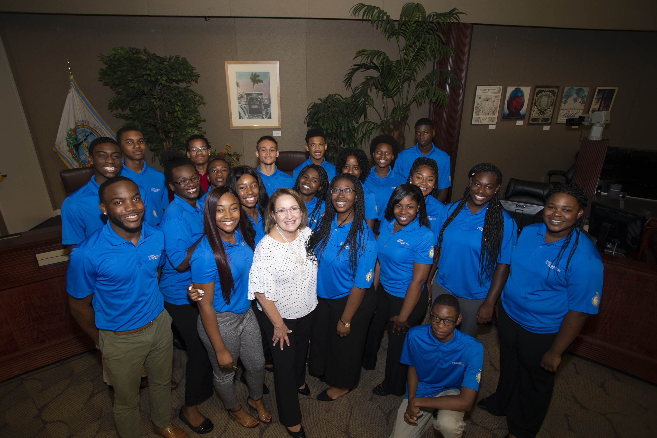 Mayor Jacobs and teens smiling for a photo