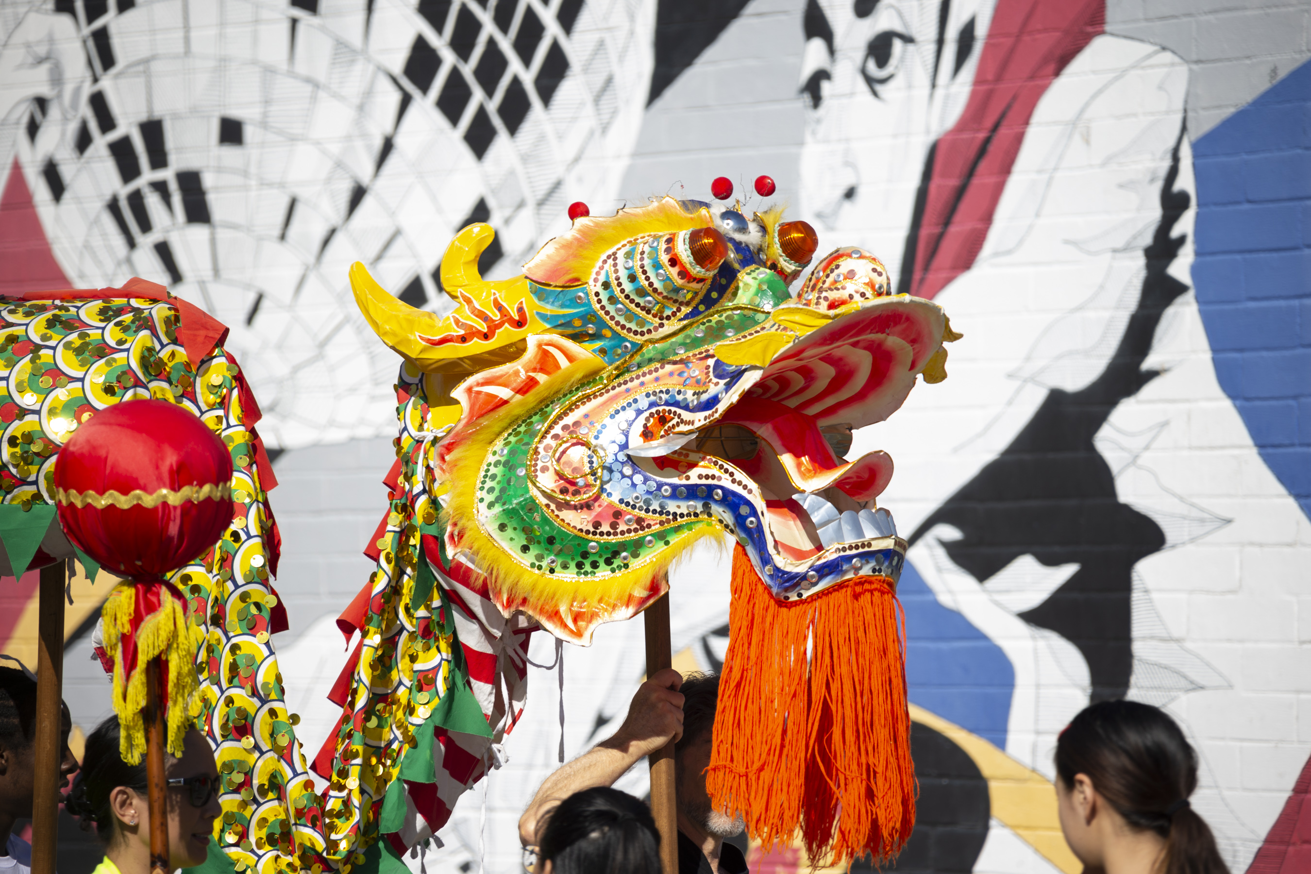 Volunteers practice the dragon dance for the 2019 Dragon Parade and Lunar New Year Festival in Orlando’s Mills 50 Main Street District.