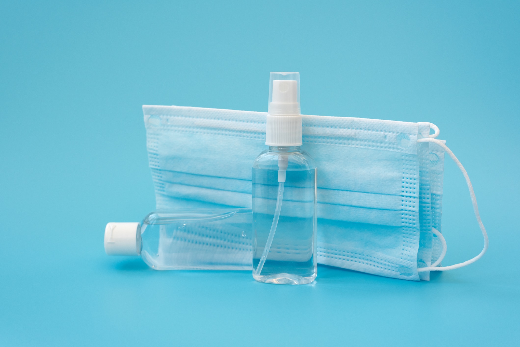 Surgical facemasks and small spray hand sanitizers