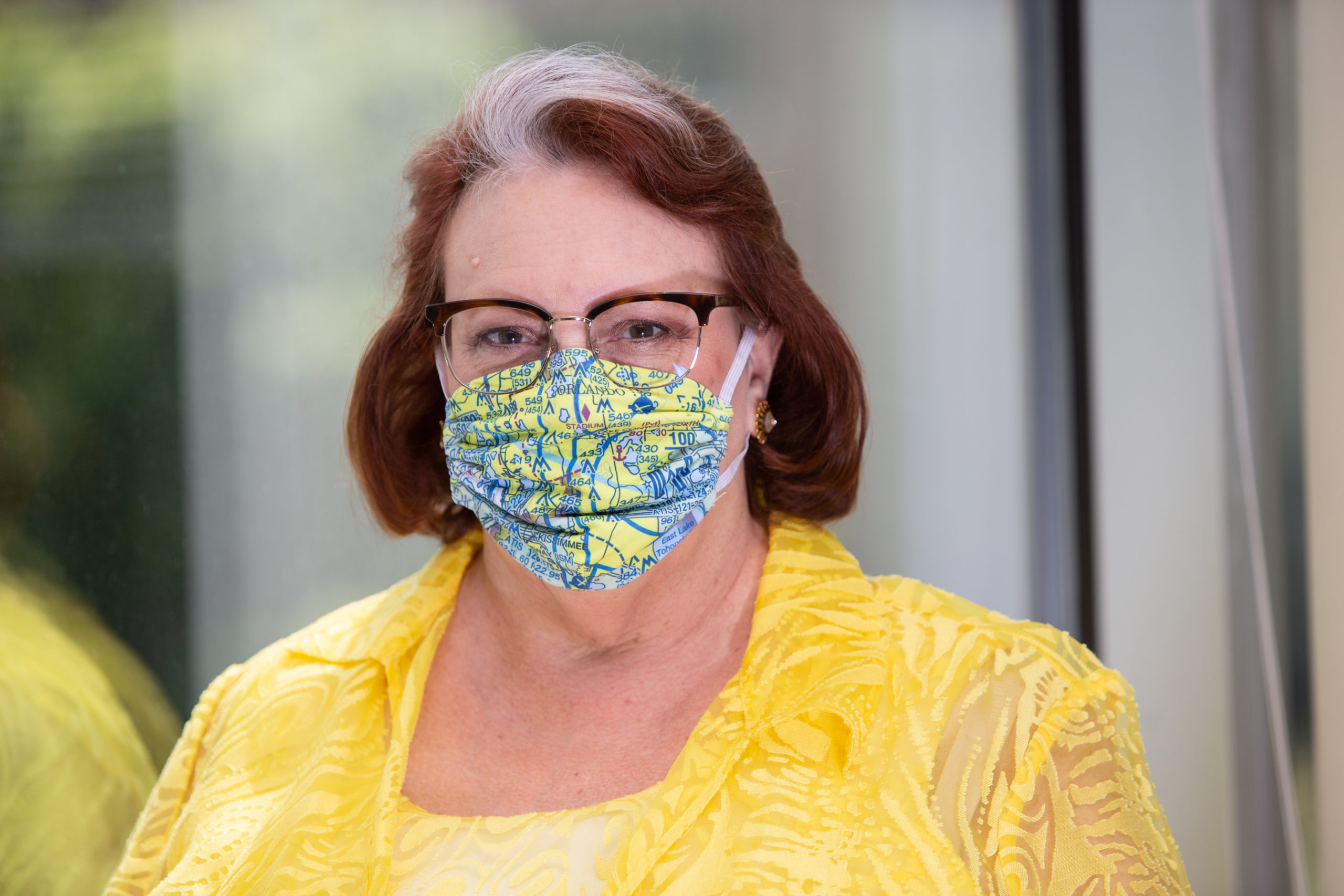 Cheryl Gillespie, Orange County Government’s Supervisor of Agenda Development, wears one of the “Chart It All” facemasks.