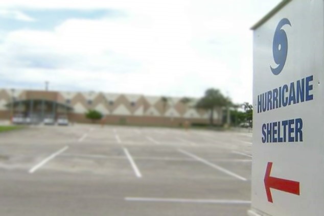 Hurricane Shelter sign pointing to school