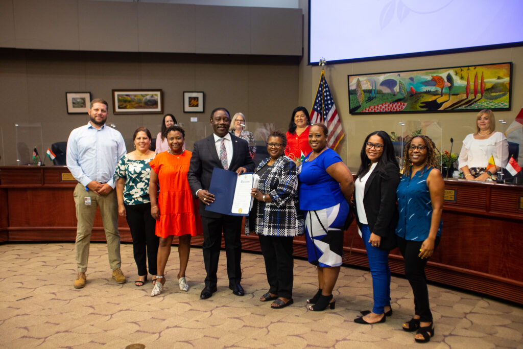Lavon Williams, Acting Director for the Community and Family Division along with staff members in celebration of Community Action Month accept the proclamation from Mayor Jerry Demings.